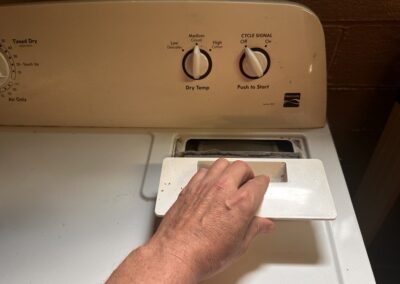 Locate the Lint Trap on the Dryer